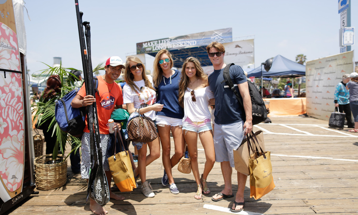 Competitors and spectators celebrate decades of surf, lifeguard adn paddleboard history at the Santa Monica Pier Paddleboard Race & Ocean Festival, Saturday, June 8, 2013.  The all-day event, a benefit for Heal the Bay, featured standup paddle, paddleboard, ocean swim and dory races, as well as youth berach competitions, live entertainment and history exhibits.  For more info visit www.pierpaddle.com.  Photo: Matthew Brush